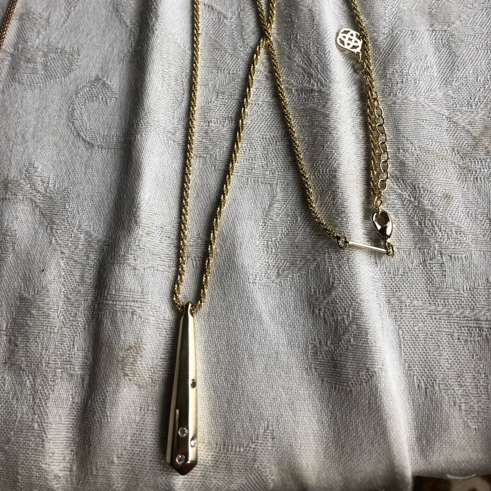Kendra Scott gold Bailee pendant necklace with crystals.